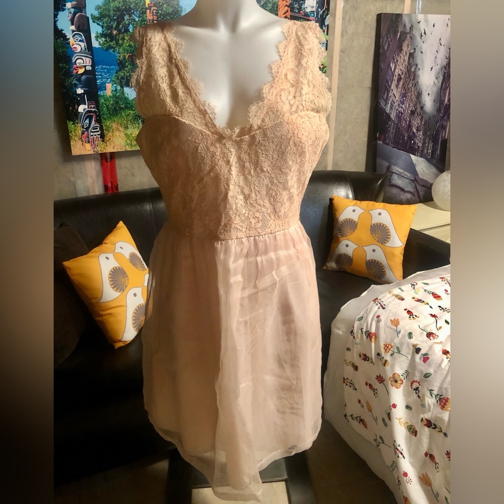Pale pink Mcginn dress with lace detail.  Size 12.  Excellent condition.